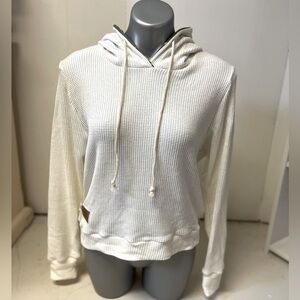 HANDMADE soft cream waist length hoodie with floral accent